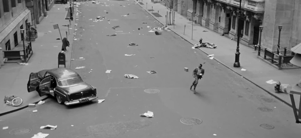 A deserted street littered with trash and debris, featuring an abandoned car with an open door and a person running through the scene.